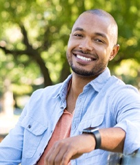 man smiling after knowing which cosmetic treatment is right for him