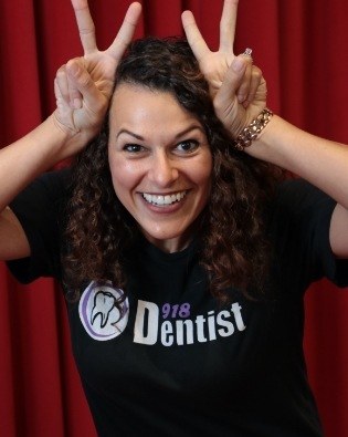 Glenpool Oklahoma dentist Dalia Georgy D D S making funny face