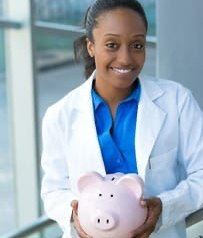 Dentist holding piggy bank representing options for making Invisalign affordable