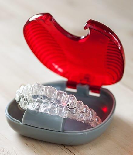 Invialign clear braces trays in carrying case