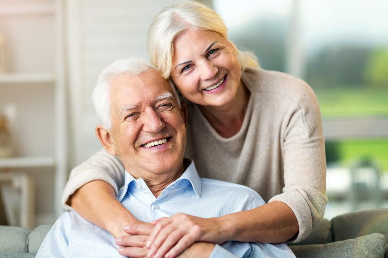 older couple smiling at home