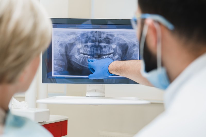 Dentist explaining why tooth enamel in Glenpool lasts so long